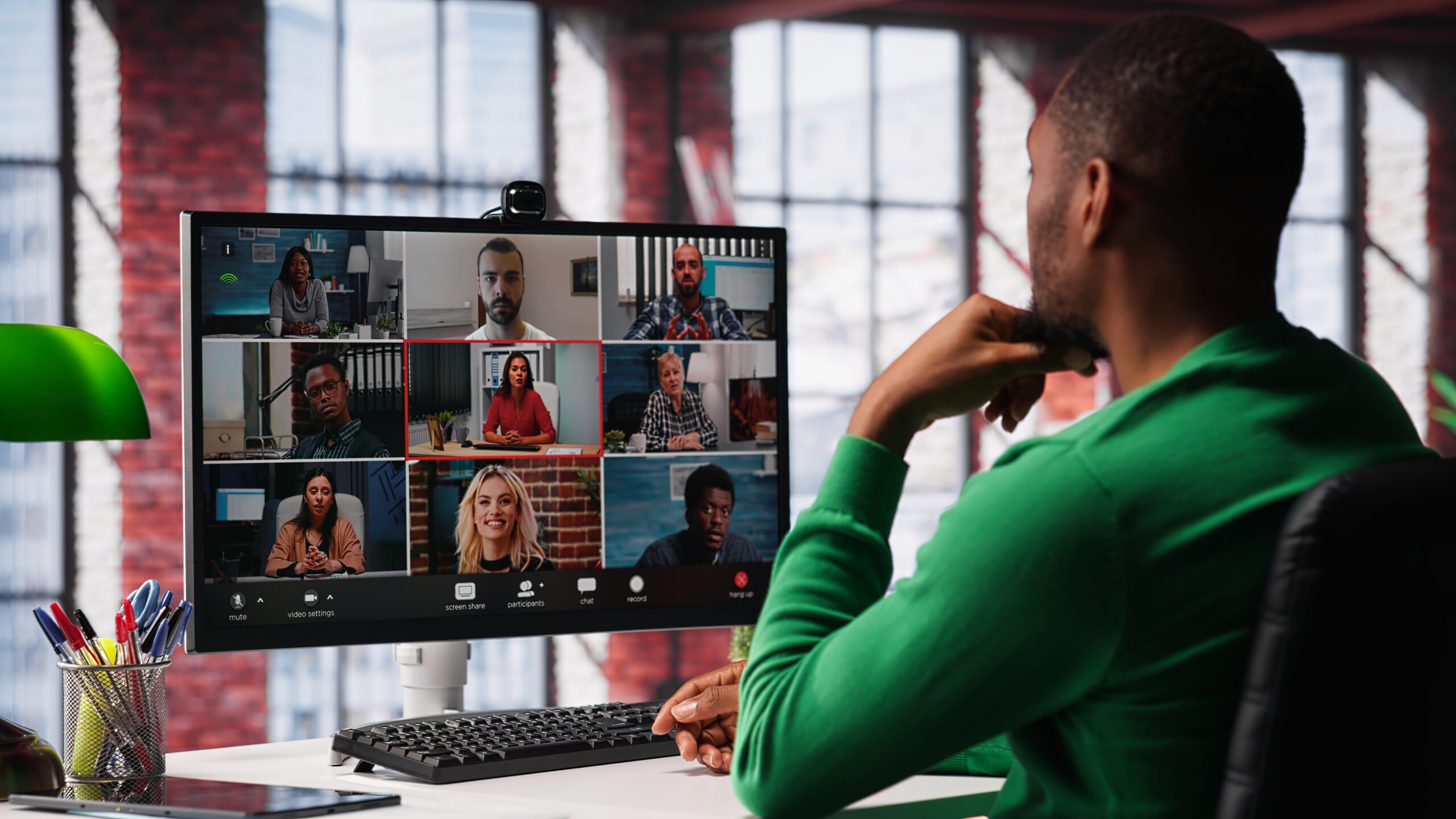 Manager talking to employees during web video call at home, analyzing business documents, organizing job tasks. Supervisor doing remote teleconference meeting with staff members. Camera A.